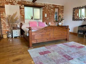 Main bedroom- click for photo gallery